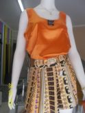 Shortinho + blusa em cetim + cinto em couro e pedra natural